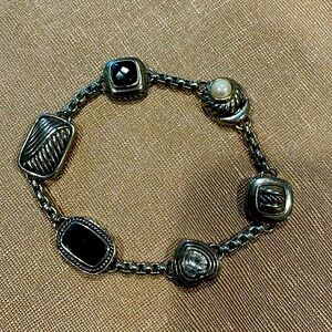 Silver-Toned Bracelet with Magnetic Closure.